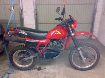 Hinterrad und endlos Kette gewechselt (Ist am Garagentor aufgehangen ,wenn das der Vermieter gesehen hätte *G*)